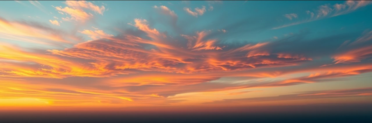 Calm yoga inspired tranquil sunset sky with orange and yellow clouds.